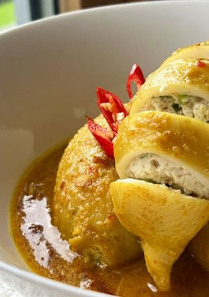 A picture of Squid Curry Stuffed with Tofu and Egg.