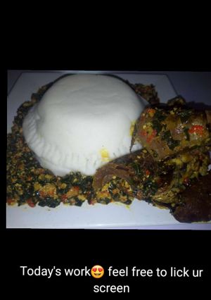 A picture of Efo elegusi served with pounded yam.