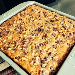 A picture of Banana cake with choc-walnut streusel.
