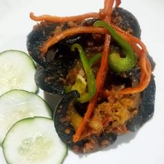 A picture of Peppered snail.