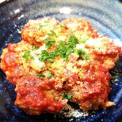 A picture of Meatless Meatballs made from Banana Peels 🍌.