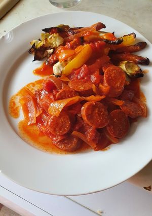 A picture of Chorizo and tomatoes.