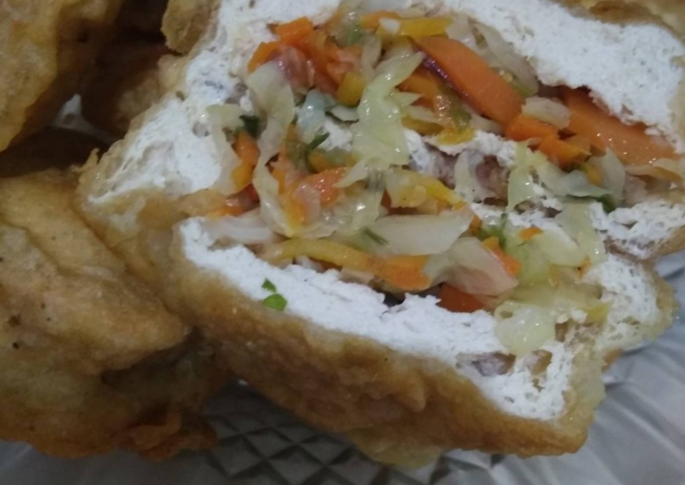Tahu Isi Mercon