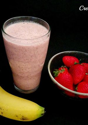 Una foto de Smoothie de fresas, plátano y chocolate