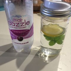 A picture of Infused Water (Cucumber, Lemon and Mint Leaves).
