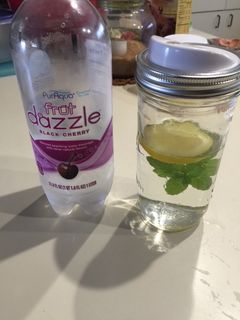 A picture of Infused Water (Cucumber, Lemon and Mint Leaves).