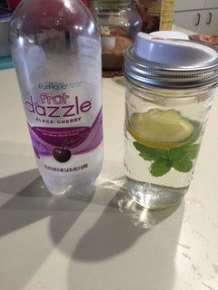 A picture of Infused Water (Cucumber, Lemon and Mint Leaves).