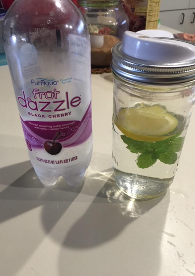 A picture of Infused Water (Cucumber, Lemon and Mint Leaves).
