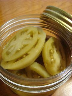 A picture of Pickled Green Tomatoes .