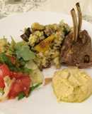 Cordero horneado, cous cous con vegetales