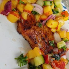 A picture of Grilled peach salsa turkey cutlets.