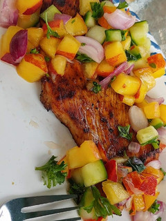A picture of Grilled peach salsa turkey cutlets.