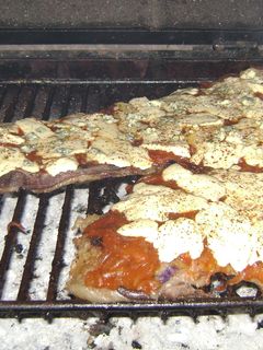 Una foto de Matambre a la pizza en la parrilla 