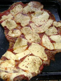 Una foto de Matambre de cerdo a la pizza