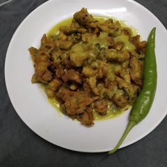 A picture of Authentic spinach pakoda kadhi.