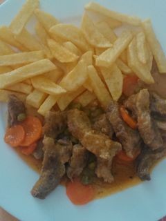 Una foto de Costillas de cerdo ibérico en salsa aromática