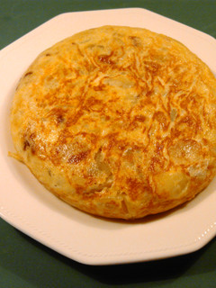 Una foto de Tortilla de patata rellena