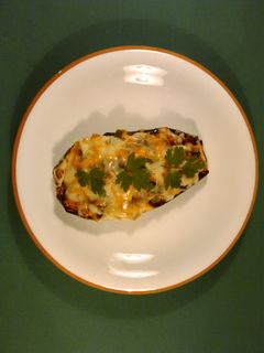 Una foto de Berenjenas rellenas de carne picada y champiñones