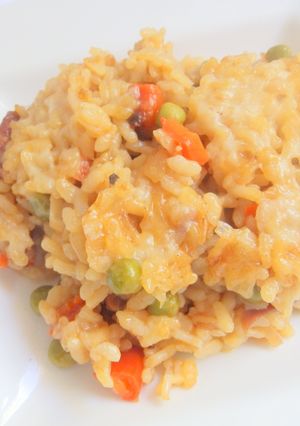 Una foto de Arroz meloso con jamón gratinado