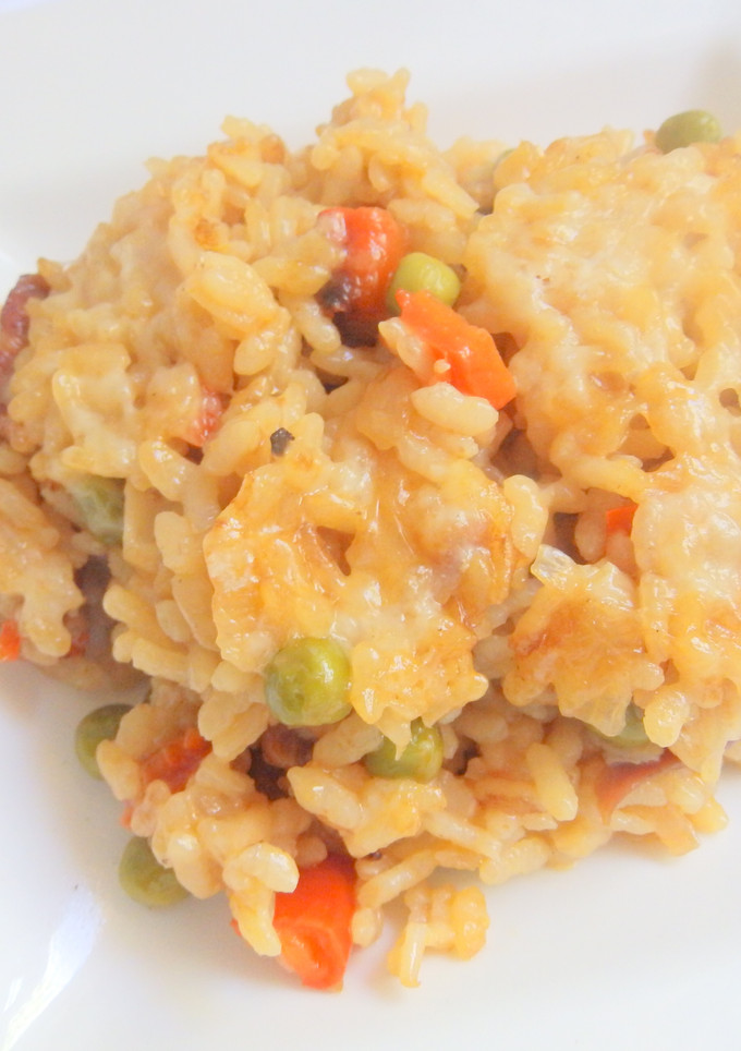Una foto de Arroz meloso con jamón gratinado