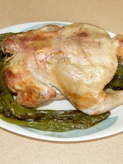 Una foto de Pollo asado (con una botella)