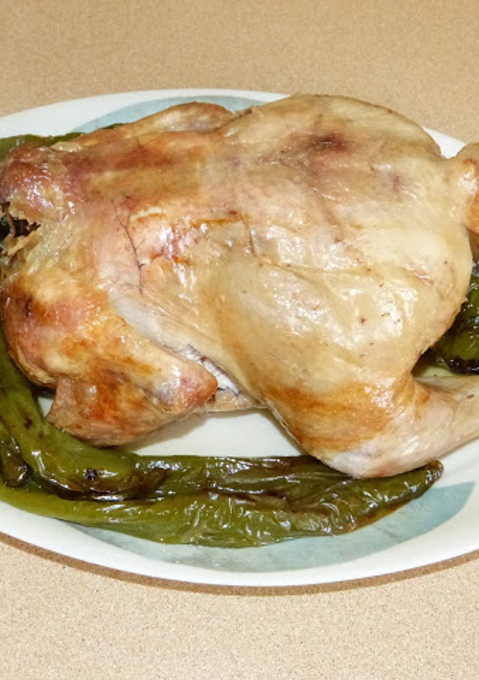 Una foto de Pollo asado (con una botella)