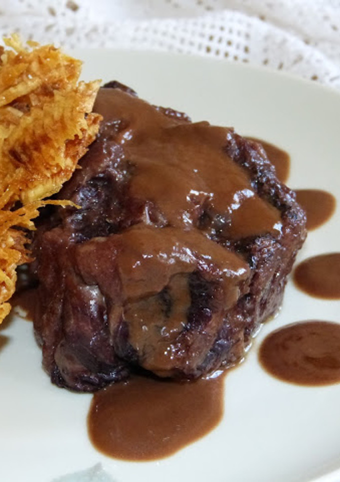 Una foto de Rabo de toro con chocolate