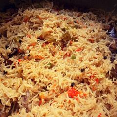 A picture of Chicken biryani cooked in milk.