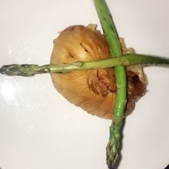 A picture of Chicken breast wrapped in filo pastry.