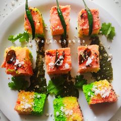 A picture of Tricolour Dhokla with Spinach and Beet.