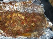 Una foto de bondiola al horno con salsa barbacoa