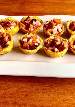 Una foto de Canasta bellaca con salsa de la selva su chorizo