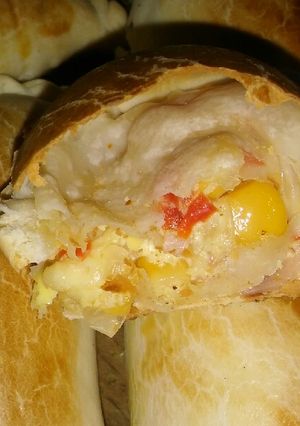 Una foto de Empanadas de choclo, jamón y queso