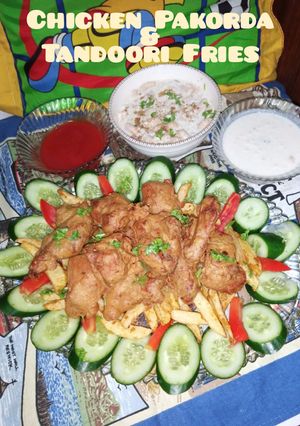 A picture of Chicken Pakorda & Tandoori fries 🍟🍗.