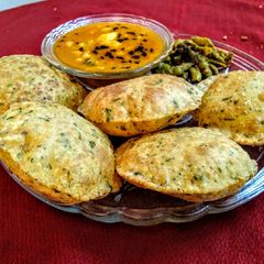 A picture of Masaledar Spicy Aalo With Ajwain Methi Puri.