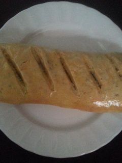 Una foto de Pan de ajo y orégano