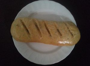 Una foto de Pan de ajo y orégano
