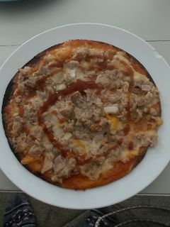 Una foto de Pizza en tortilla de trigo