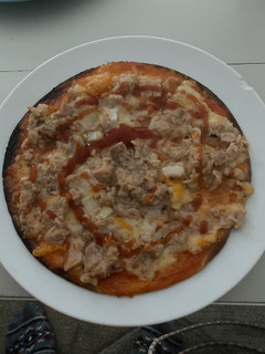 Una foto de Pizza en tortilla de trigo