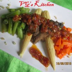 A picture of Steamed Fish with Sambal (IKAN KUKUS).