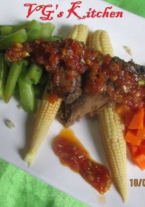 A picture of Steamed Fish with Sambal (IKAN KUKUS).