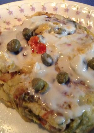 Una foto de Tortilla de trigueros con jamón y champiñones