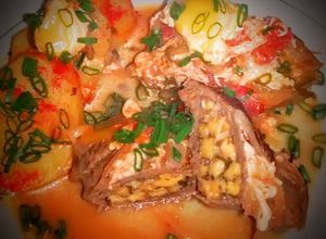 Una foto de Bifes a la criolla rellenos