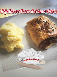Una foto de Hojaldre relleno de lomo ibérico