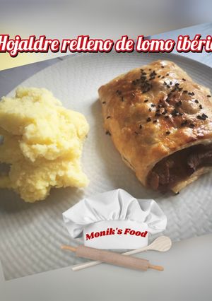 Una foto de Hojaldre relleno de lomo ibérico