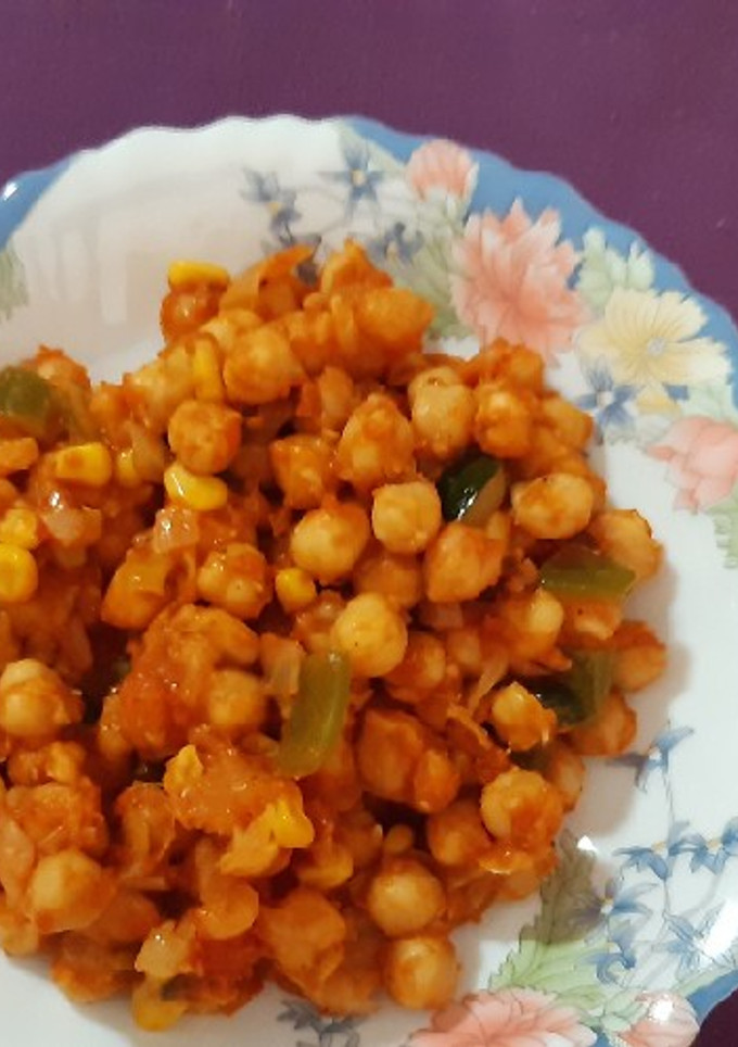 Una foto de Garbanzos con tomate y verduras. Receta saludable