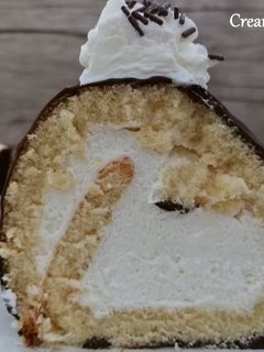 Una foto de Tronco navideño de nata
