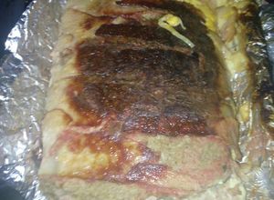 Una foto de Rollo de carne de res relleno de varios ingrediente a la Mario, s