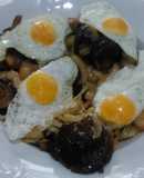 Revuelto de shiitake con gambitas y huevo de codorniz
