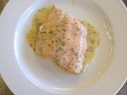 Una foto de pescado al horno a la sidra